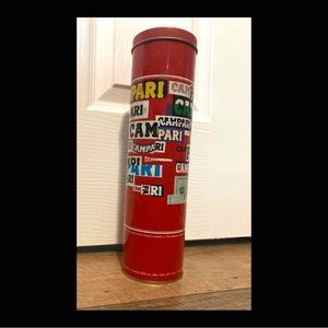 Vintage Campari tin, Bruno Murani artwork.
storage tin, bar decor, Moma New York